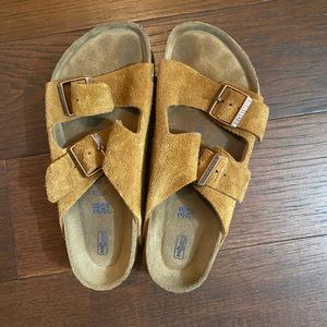 Size 7-7.5 wide in Birkenstock’s, worn twice.